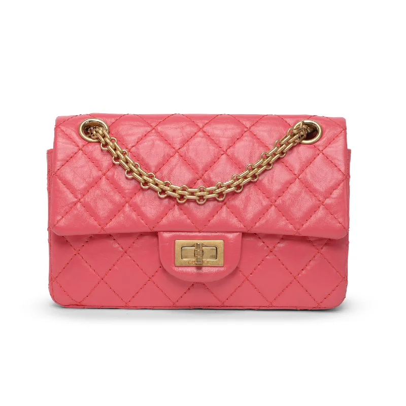 Handle bags with sturdy bases for stability -Chanel Pink Aged Calfskin Reissue Mini Flap Bag