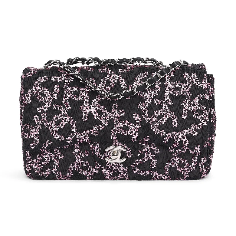 Handle bags with contrast stitching for detail -Chanel Black & Pink CC Sequins Medium Flap Bag