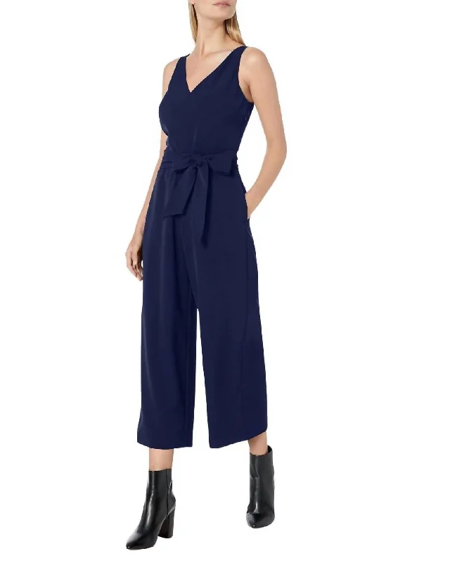 Boho-inspired tight trousers for women with earthy tones and relaxed fit -Sleeveless V-Neck Jumpsuit In Blue