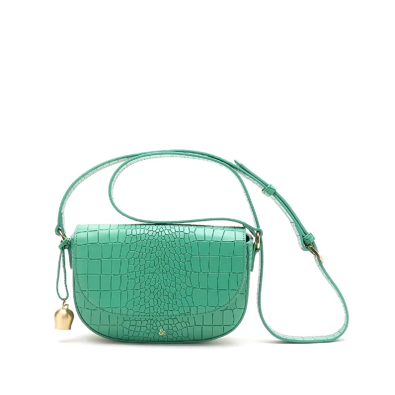 Handle bags with playful pom-poms for charm -CALLIE Mini Saddle Cross Body Bag - Mint