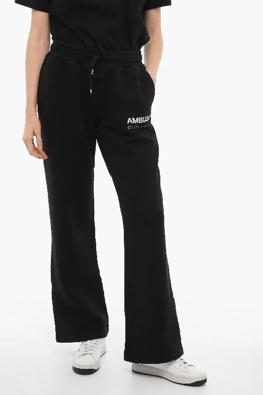 Light denim tight trousers for women with casual fit and comfortable material -Ambush Solid Color Sweat Pants with Printed Logo