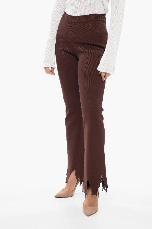 Pleated tight trousers for women with vintage-inspired design and modern twist -J.W.Anderson Ribbed Flared Pants with Laser-Cut Detailing