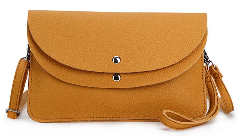 Handle bags with compact designs for portability -MUSTARD ENVELOPE MULTI-POCKET CLUTCH BAG WITH WRISTLET AND LONG SHOULDER STRAP