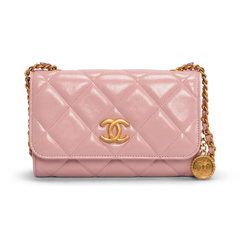 Handle bags with playful pom-poms for charm -Chanel Pink Glossy Lambskin CC Medallion Wallet on Chain