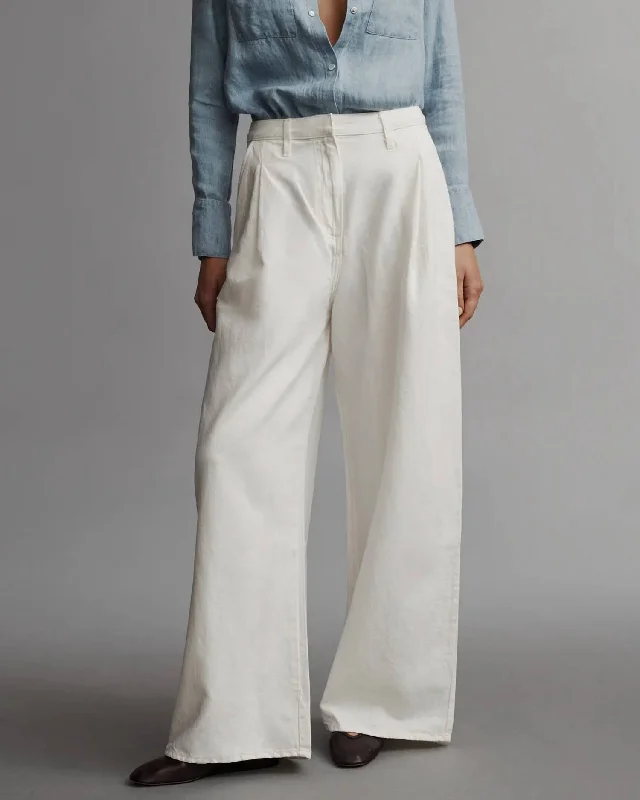 Fashion-forward tight trousers for women with metallic sheen and edgy design -Greene St Pant In Wht