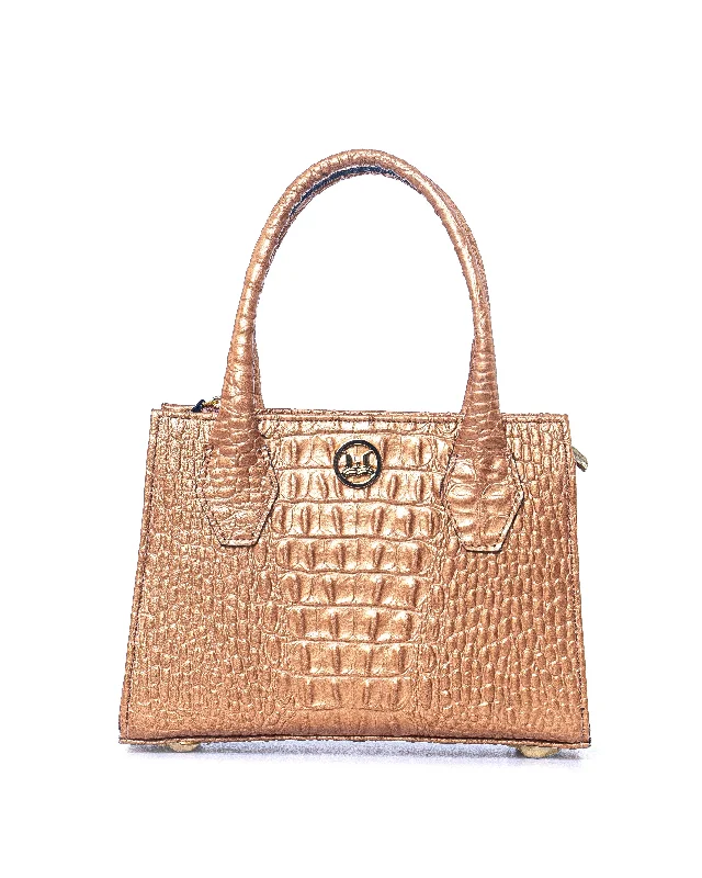 Handle bags with playful pom-poms for charm -Montreal Mini: Gold Textured Crocodile Print