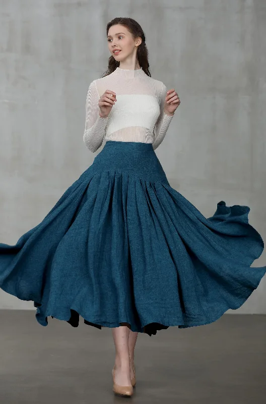 Patterned skirts for artistic standout appeal -Opera 25 | peacock blue linen skirt